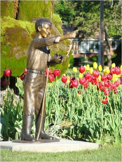 Boy With Fish Triangle Park